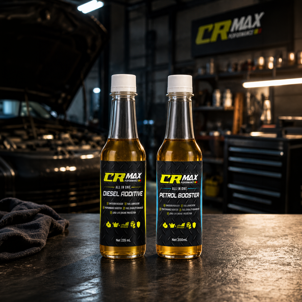 Two bottles of CRMax additives on a garage